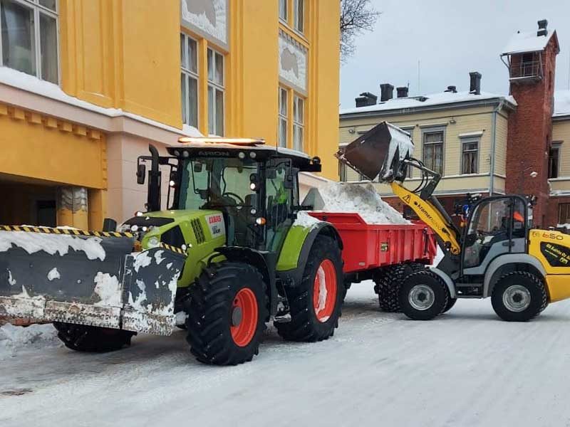 Lumen poiskuljetus kadulta.